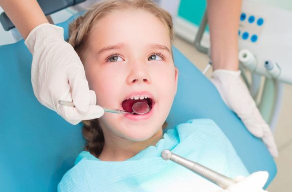 young girl getting a dental check up